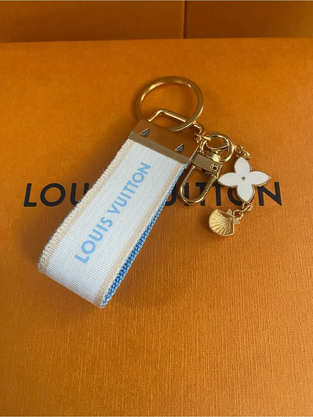 Louis Vuitton White and Light Blue Ribbon Keyring with Gold Hardware